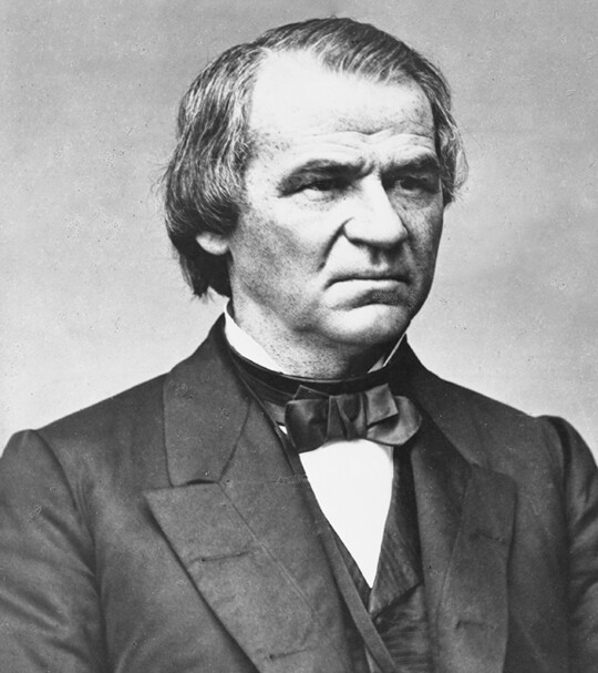 A portrait of Andrew Johnson, a Democrat from Tennessee who stepped into the role of president after Lincoln’s assassination. He has a receding hairline, no facial hair, and wears a dark jacket and vest with a black bow tie and white shirt. He introduced a Restoration Plan that required southern states to ratify the Thirteenth Amendment and limited the political power of rich ex-Confederates.