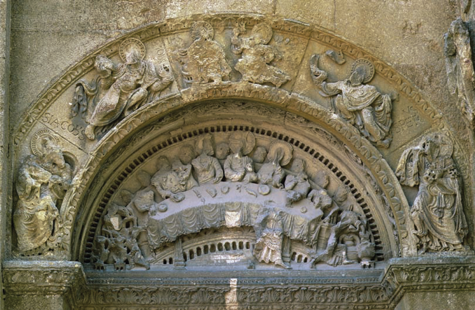 A photo shows a Last Supper carving.