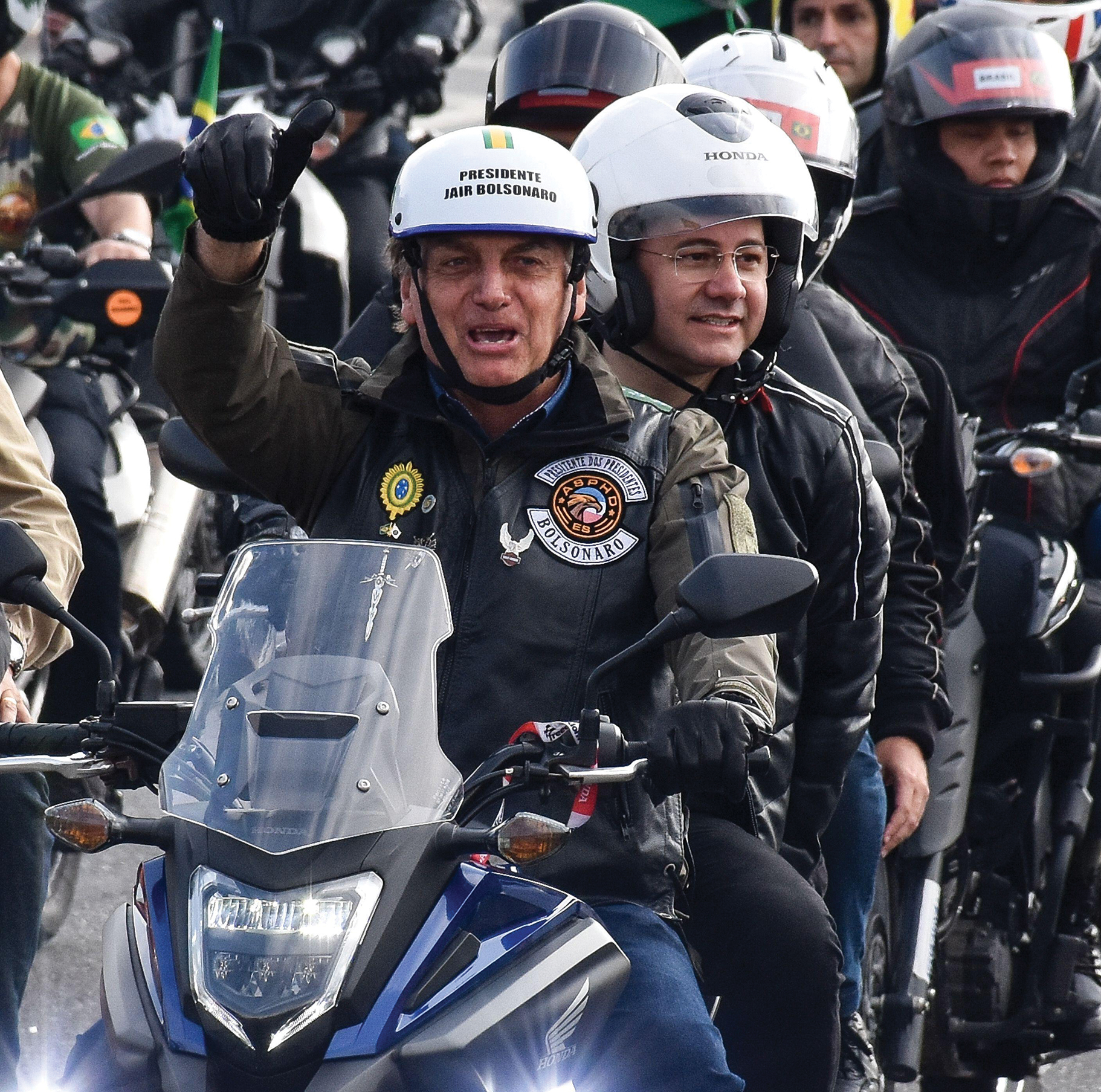 Brazilian President Jair Bolsonaro leading a group of motorcycle drivers.