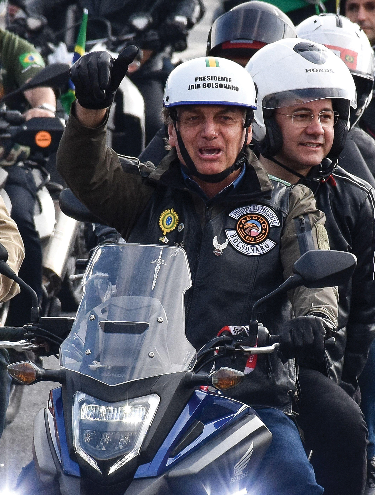Brazilian President Jair Bolsonaro leading a group of motorcycle drivers.