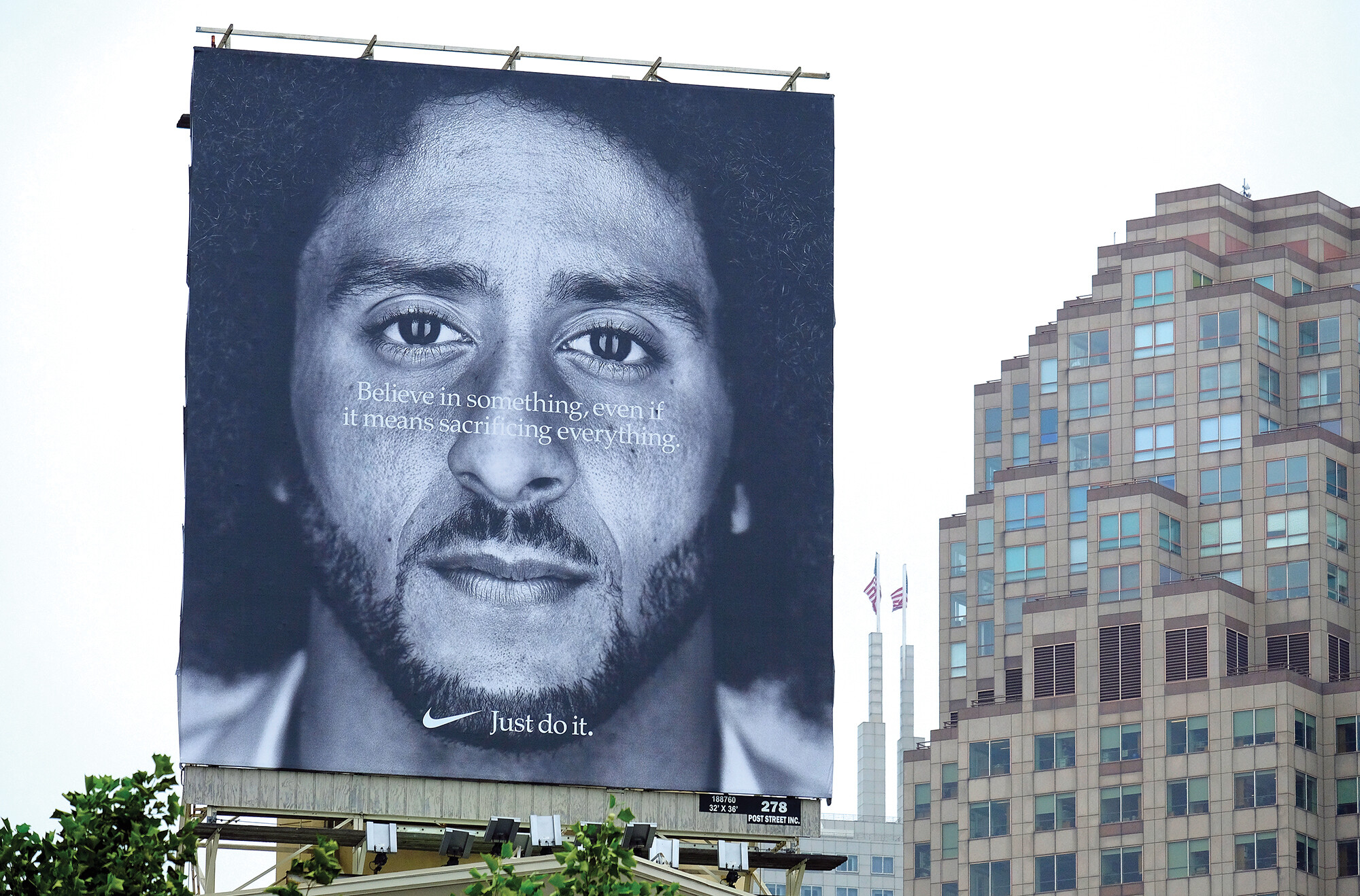 A large billboard features a Nike advertisement campaign.