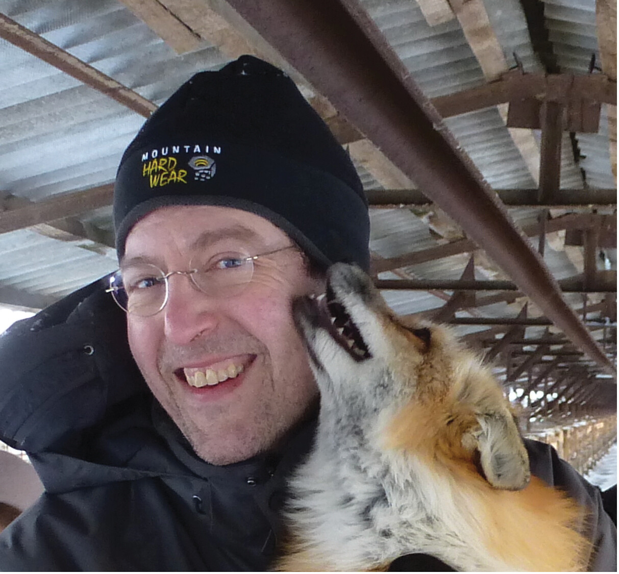A man and a fox.