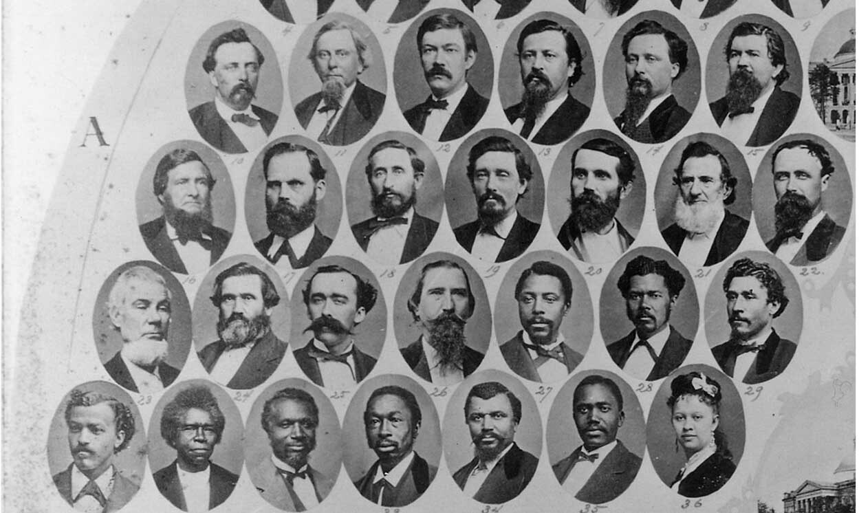 Group portrait of many men arranged in rows, likely political or organizational figures.