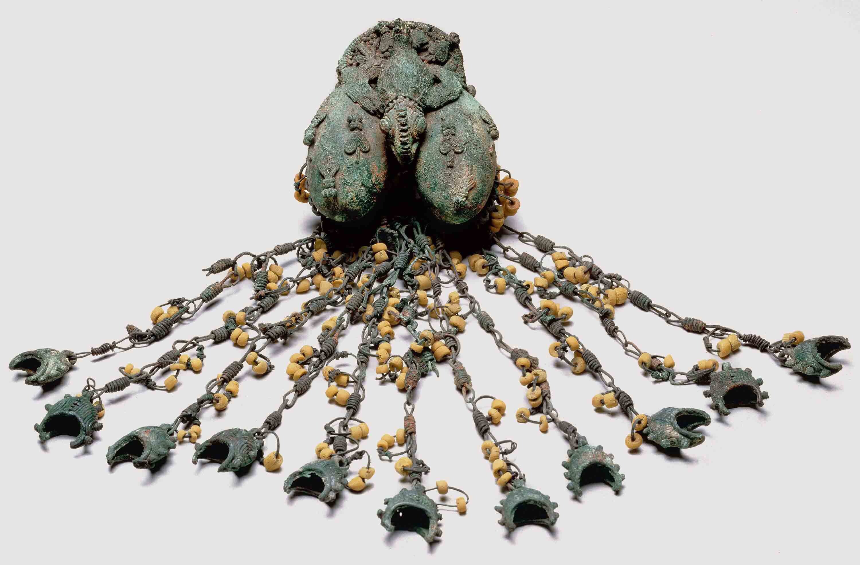 Elaborate object with many suspended attachments.