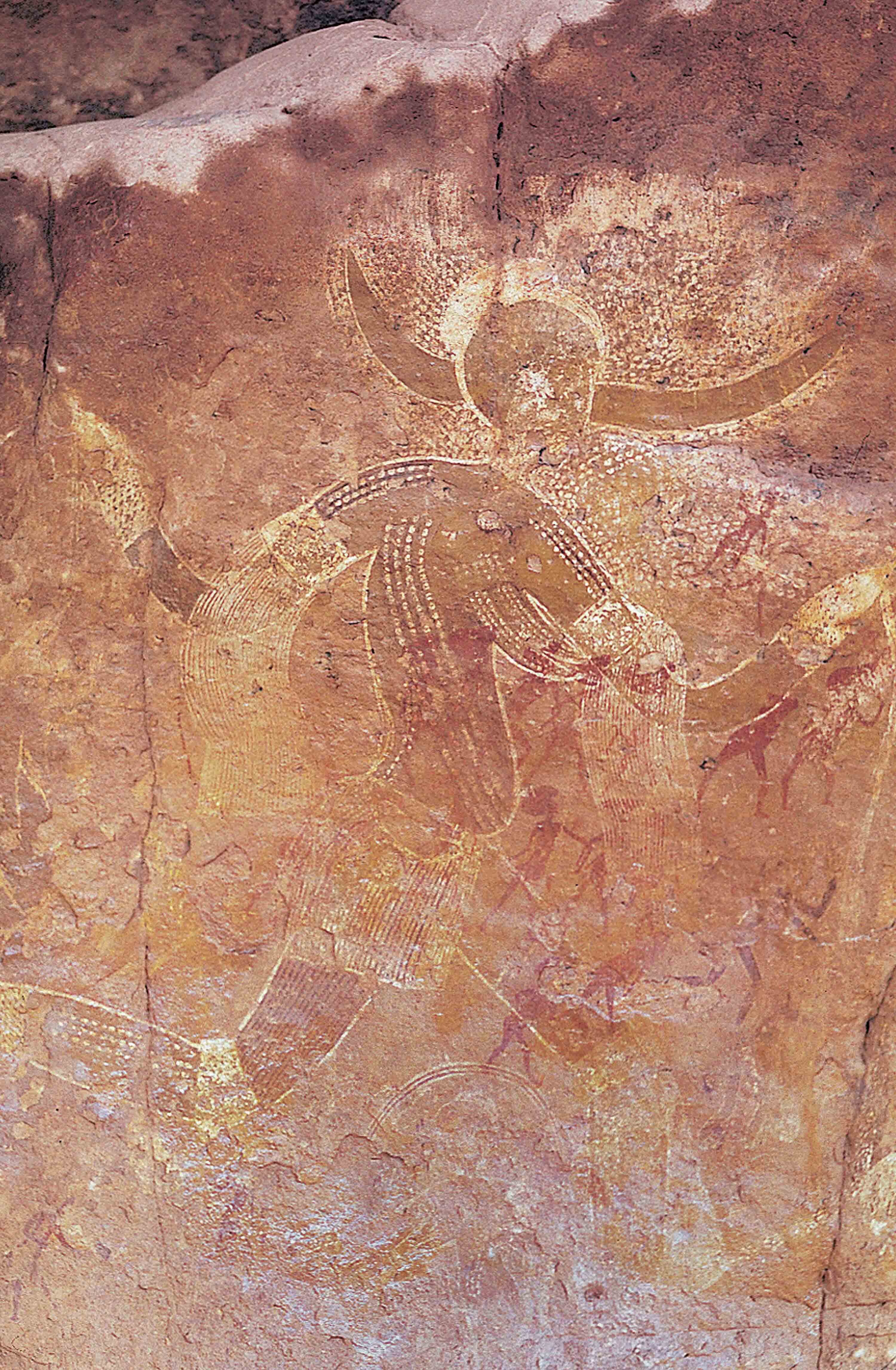Rock painting of a female figure with horns.