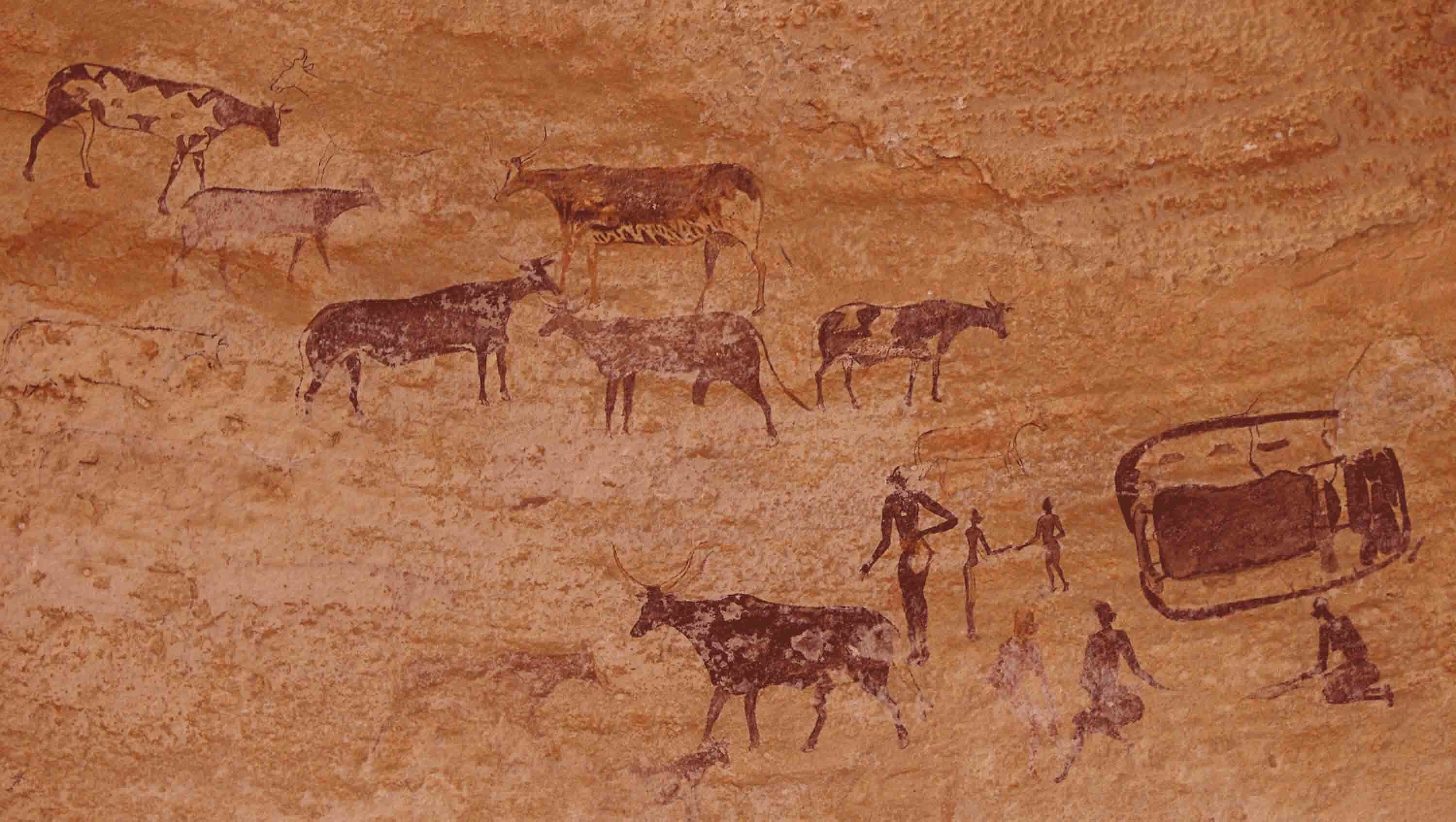 Rock painting of cattle and people in a pastoral setting.