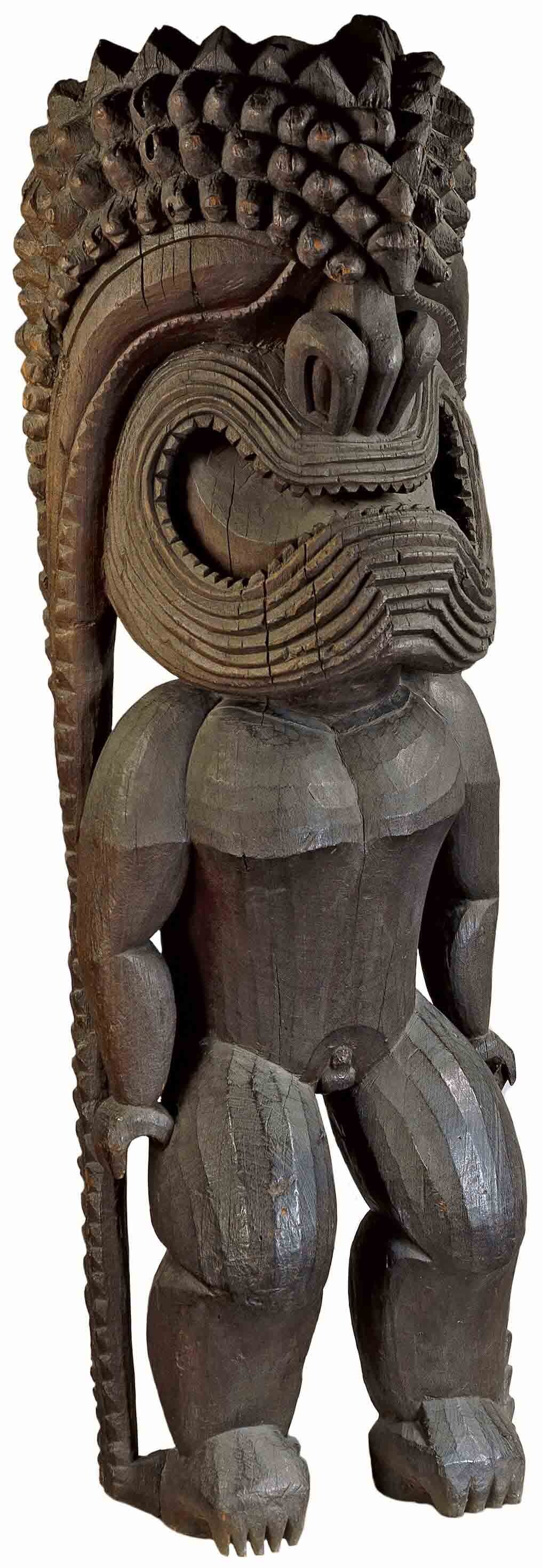 Carved wooden statue of a deity.