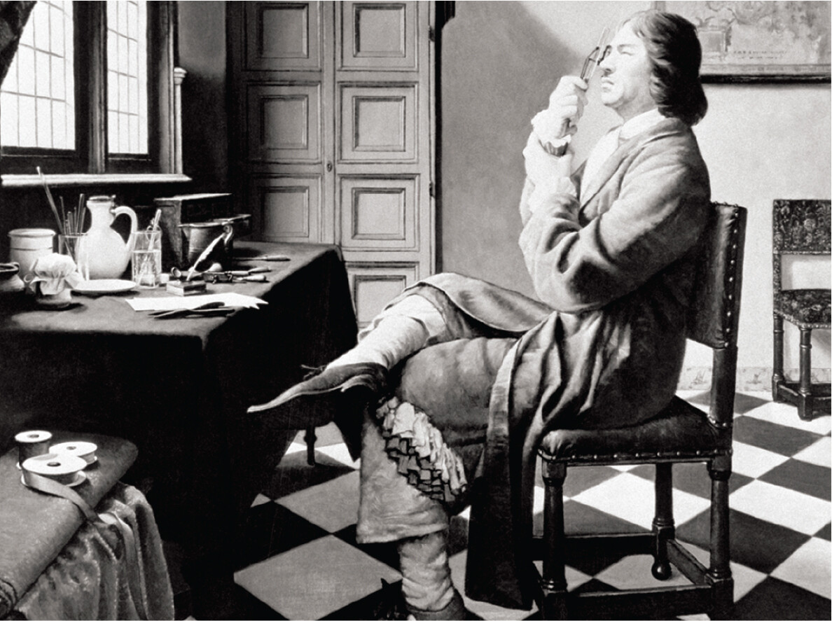 A portrait of Antonie van Leeuwenhoek seated on a chair and looking through his handheld microscope.