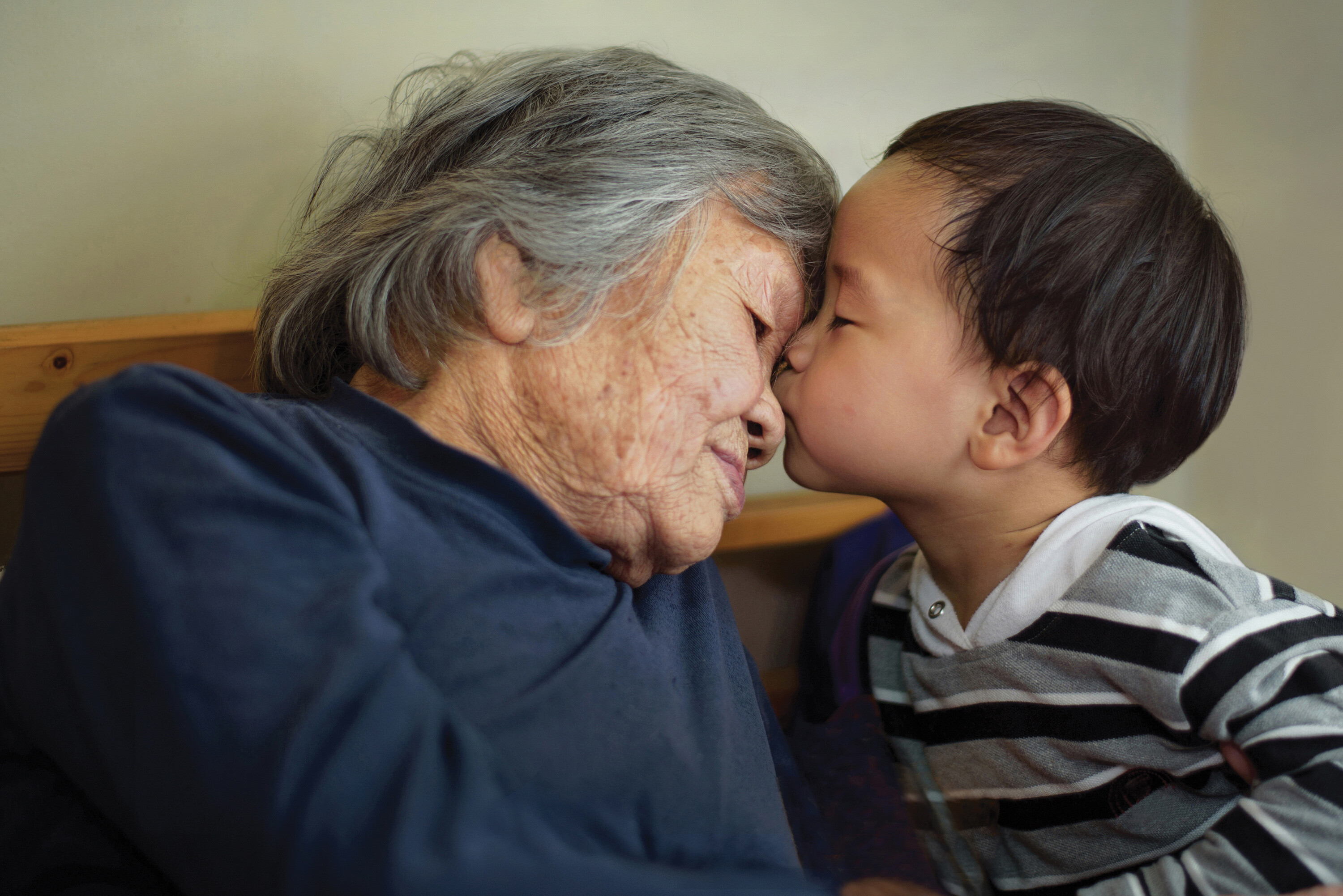 A photo of a grandmother and her grandchild.