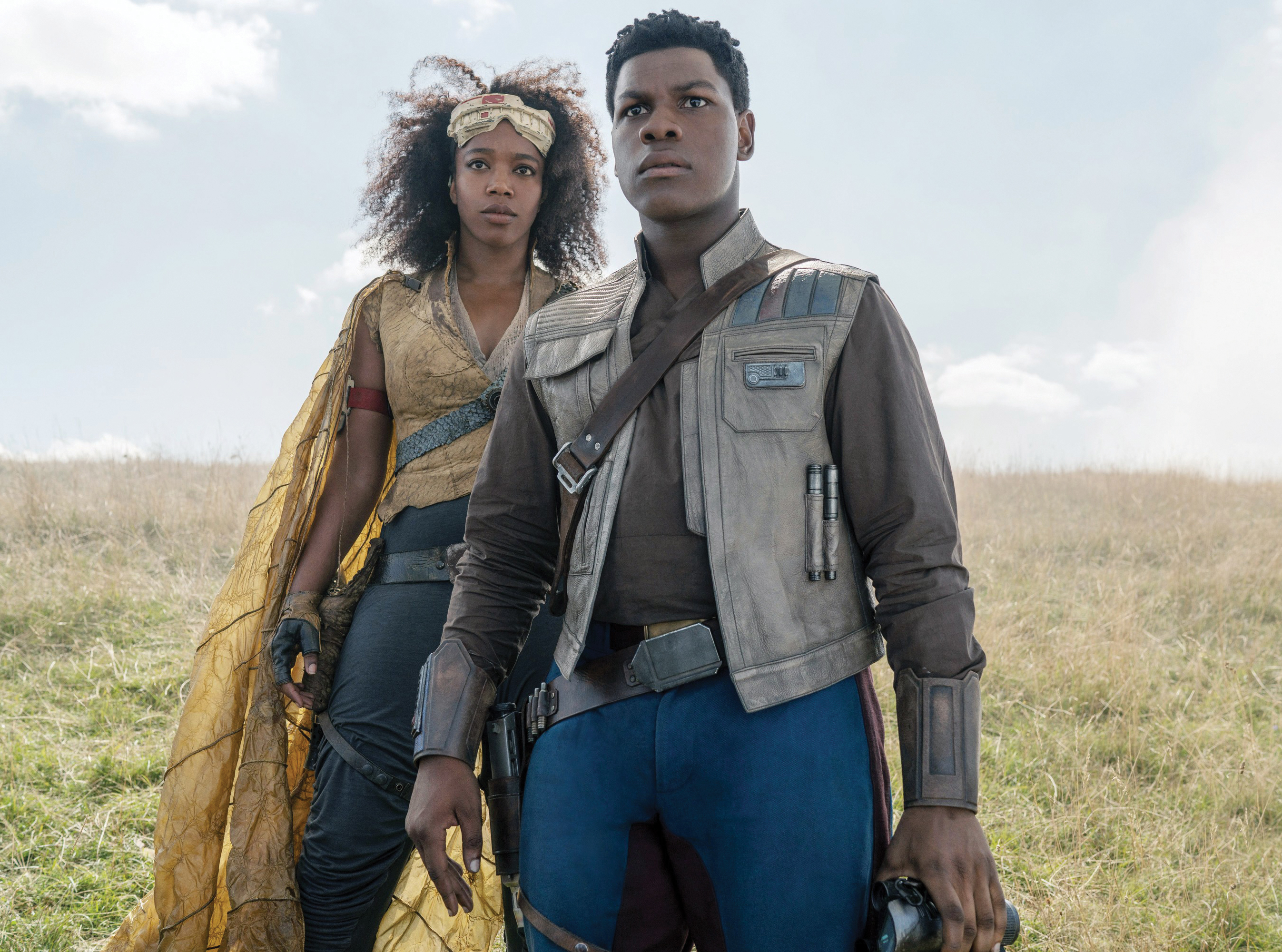 In Star Wars: The Rise of Skywalker, Jannah and Finn are shown standing and looking at something in the distance.