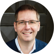 A close-up portrait of Sebastian Wernicke.