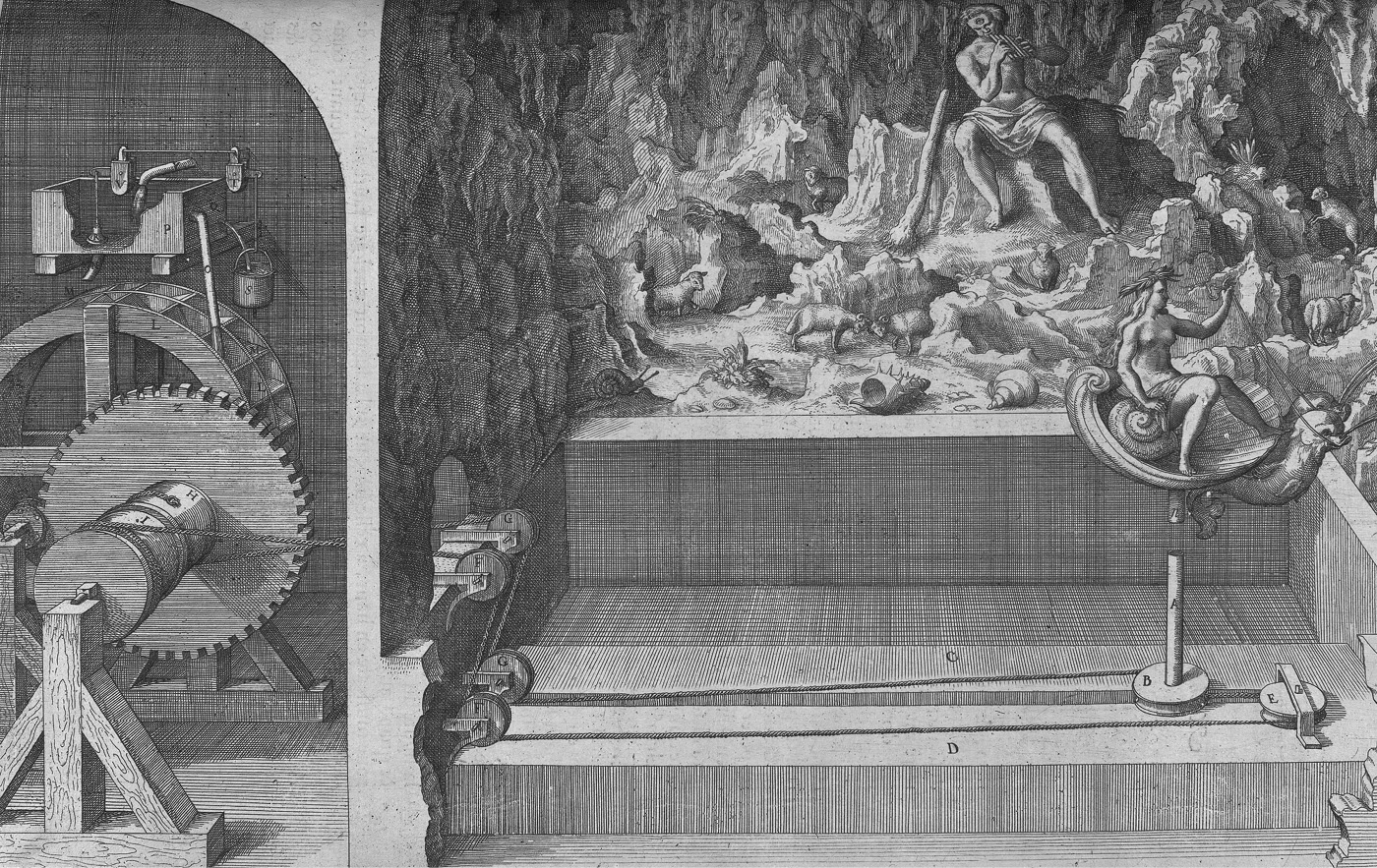 A machine consisting of a wheel and pulley system. In the background are statues of people and animals.