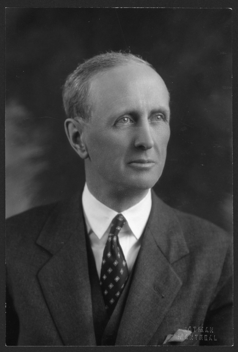 A man dressed in a suit and tie.