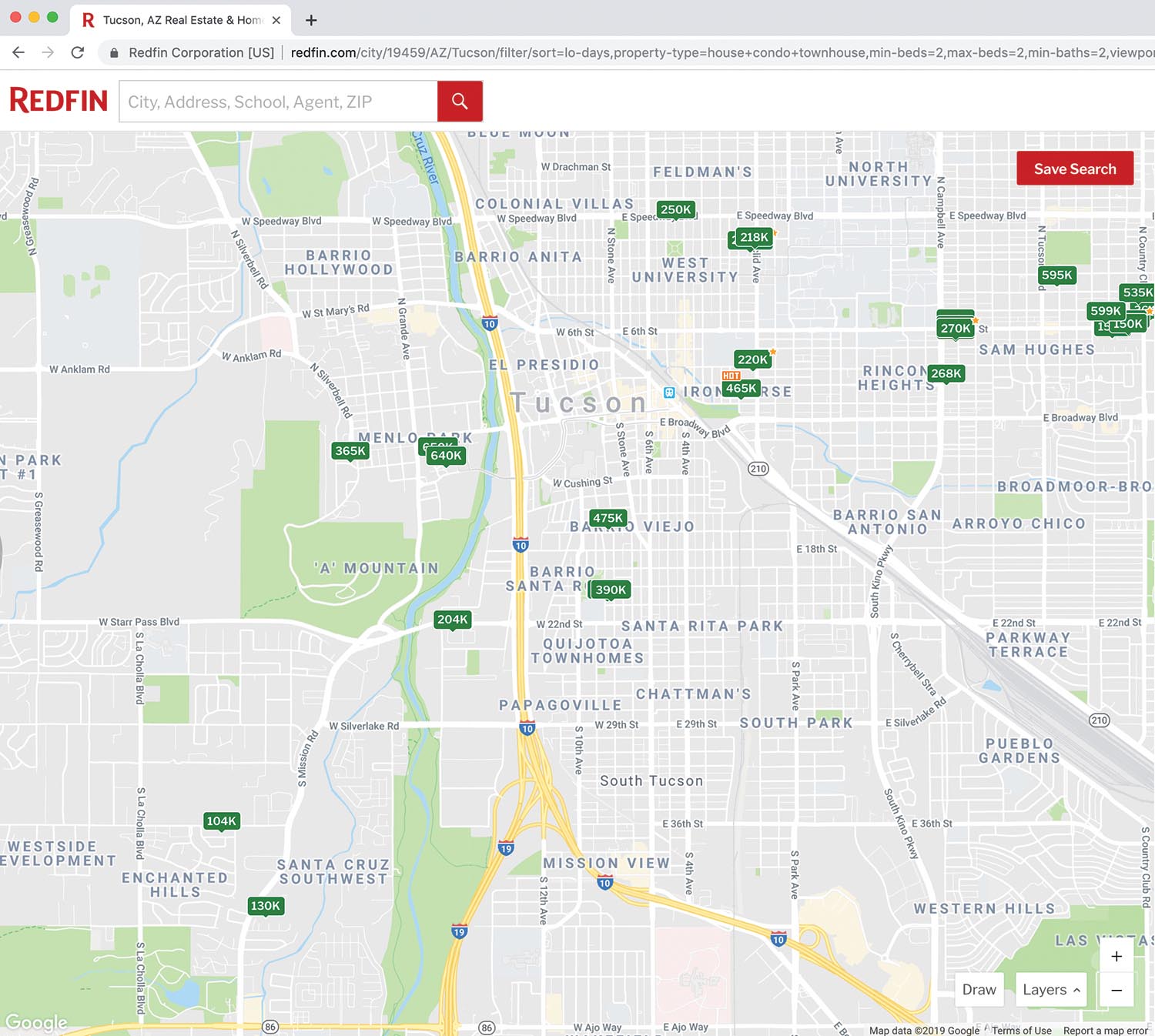 The Redfin website displays a map with house listings available in a specific area.