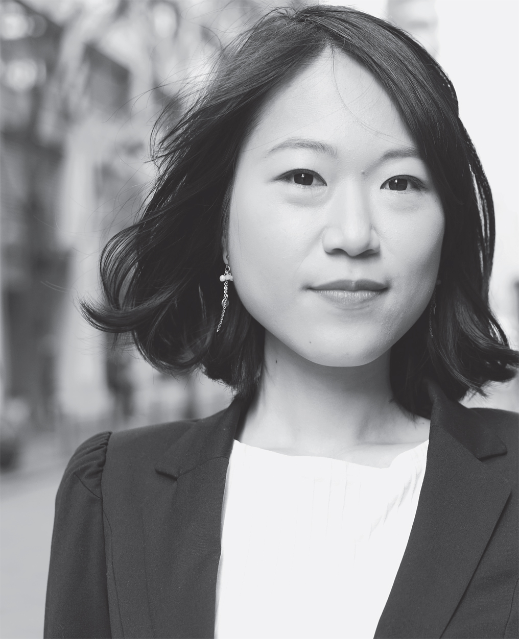 A portrait of an Asian woman.