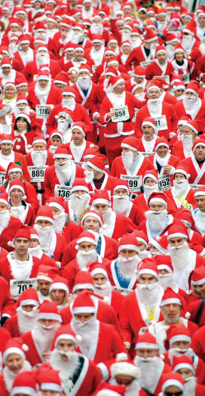 Chapter 1 Opener. The image shows numerous runners dressed in Santa Claus costumes. They are each wearing a number plate used in races. 