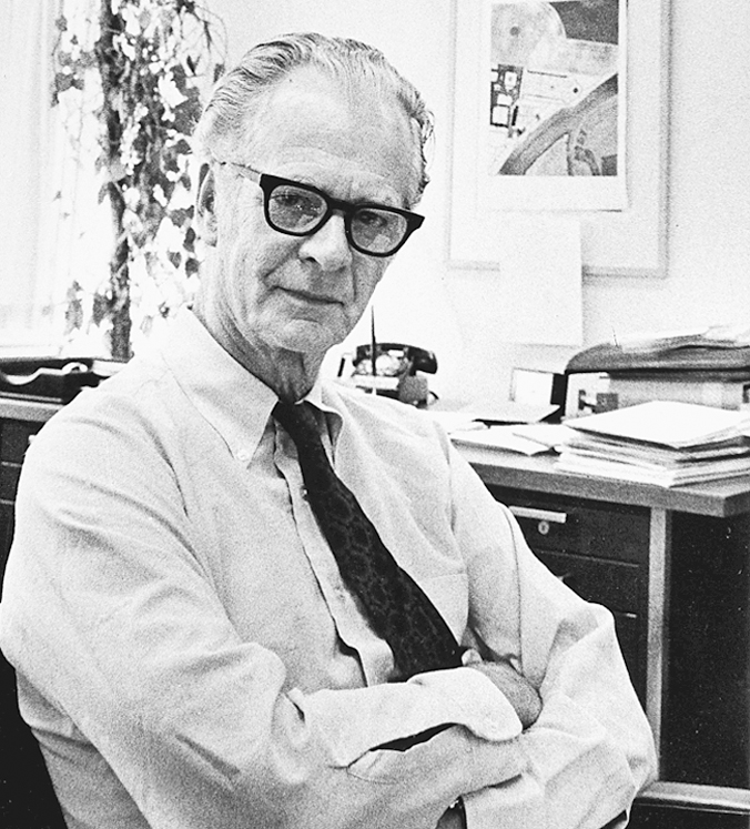 A black and white photograph shows B F Skinner.
