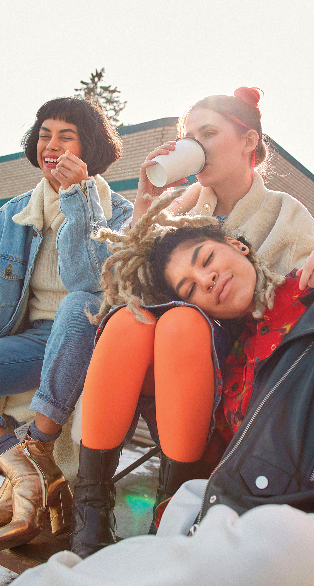 A photo shows group of young women sitting together.