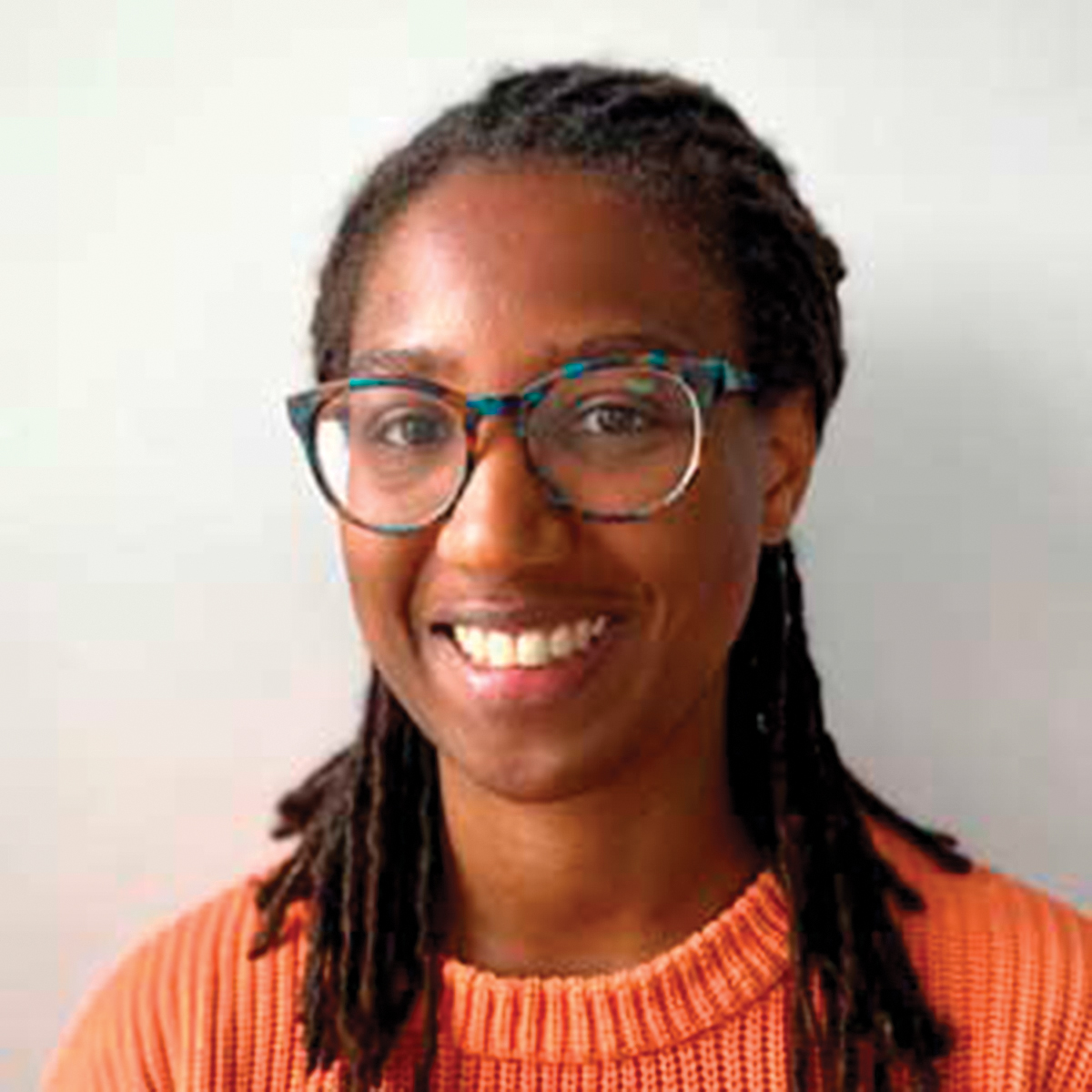 A photo shows a headshot of psychologist Kelci Harris.