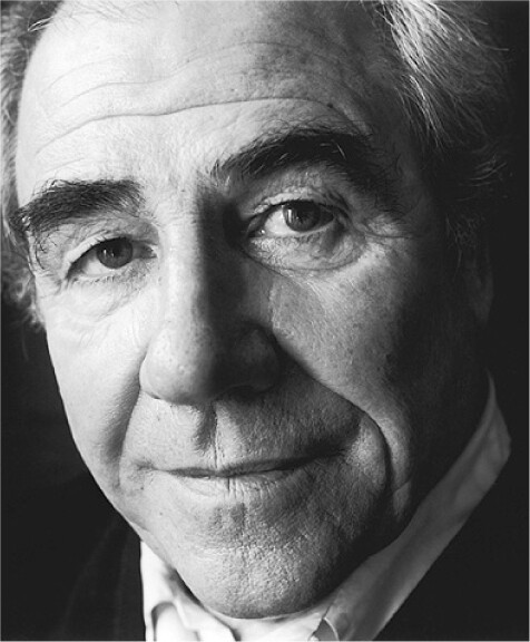 A close-up black-and-white portrait of Jean Baudrillard.
