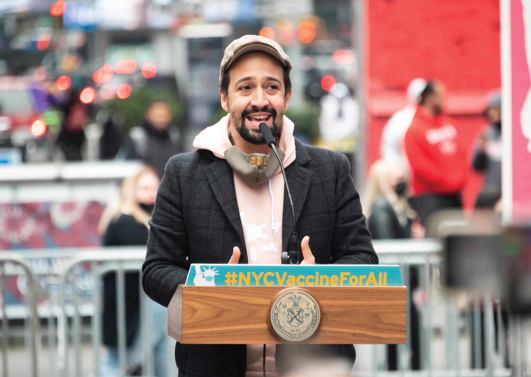 Lin-Manuel Miranda delivers a speech at the opening of the Broadway vaccination site.