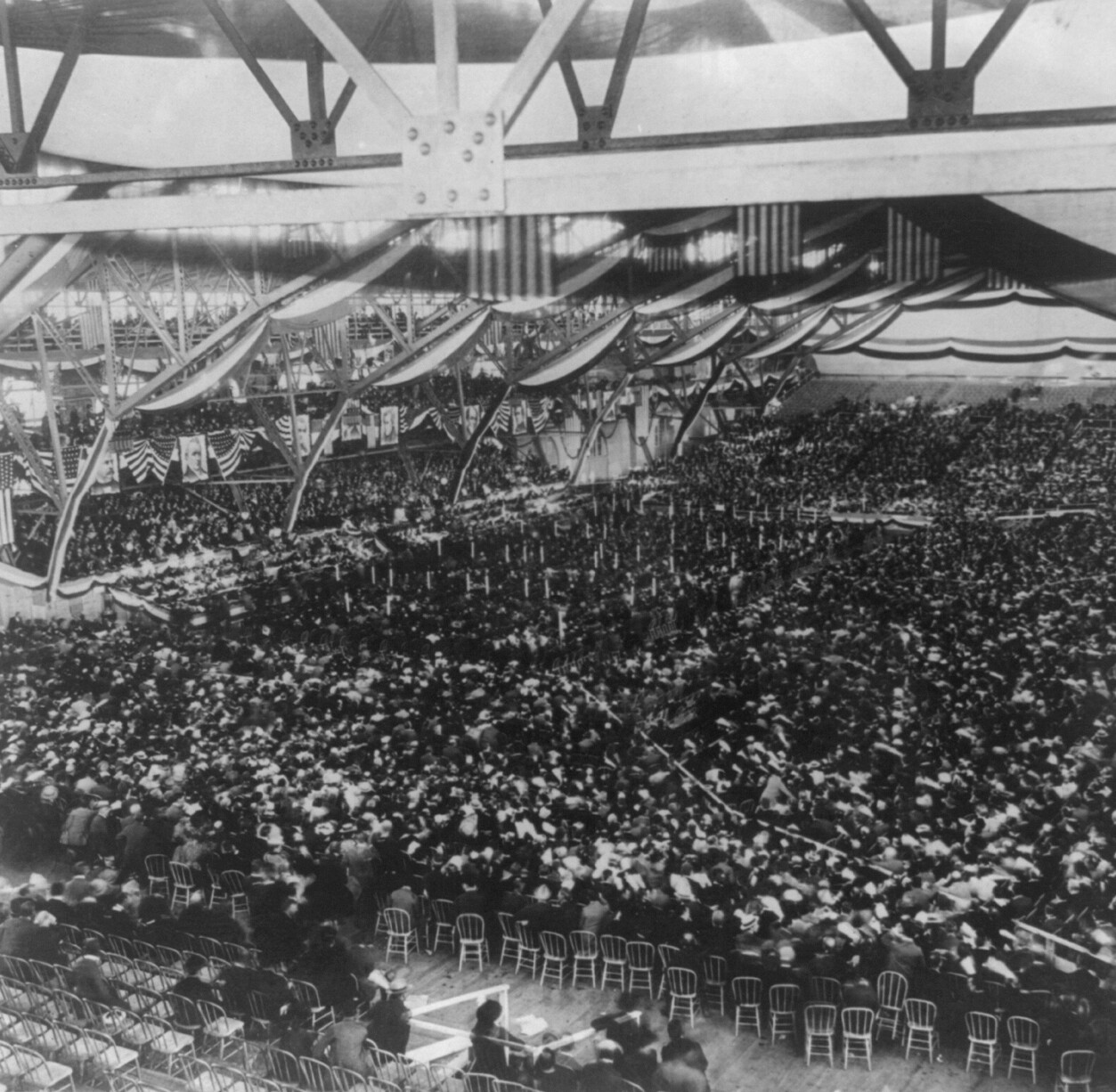 An overhead view of a massive convention crowd.