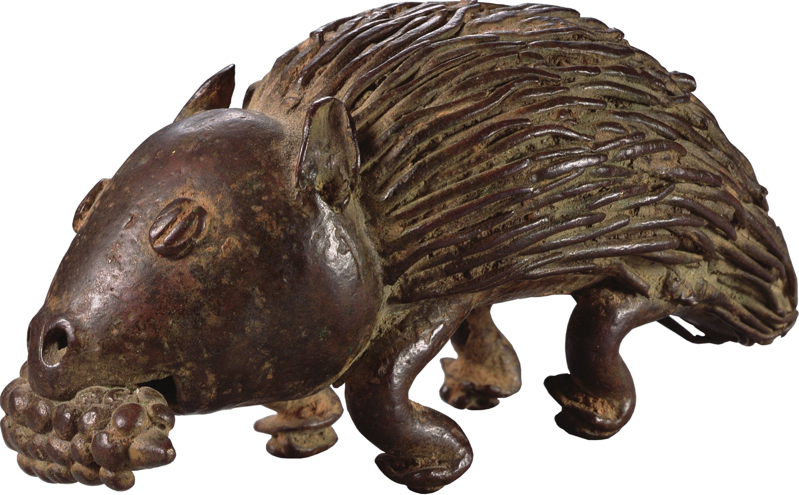 A photo shows a brass statue of porcupine with a maize cob in its mouth.