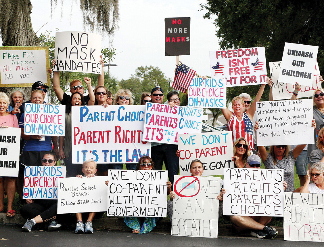 A view of marchers protesting against mask mandates.
