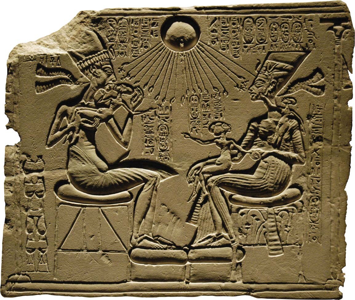 A relief sculpture of Akhenaten and Nefertiti with their three daughters.