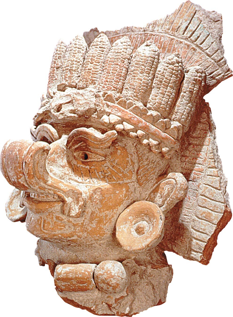 A stone statue of a deity wearing a crown made up of cornhusks.