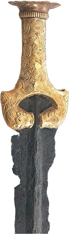 A Mycenaean sword with an engraved gold pommel on the hilt and a bronze sword blade.