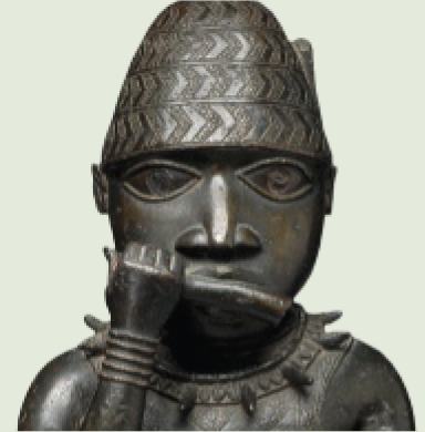 A statue of a person playing a pipe with one hand.