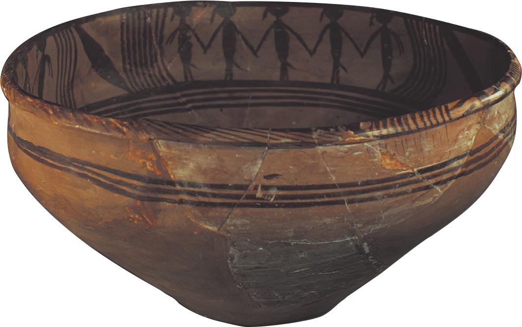 A Yangshao bowl with dancing people painted on the inside rim.