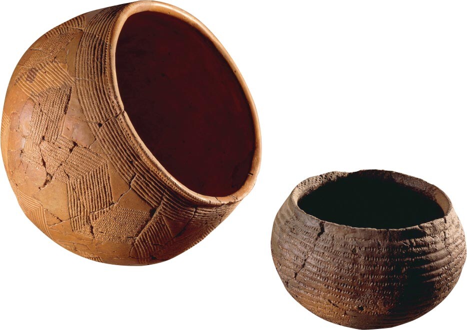 Two Corded Ware pottery vessels.