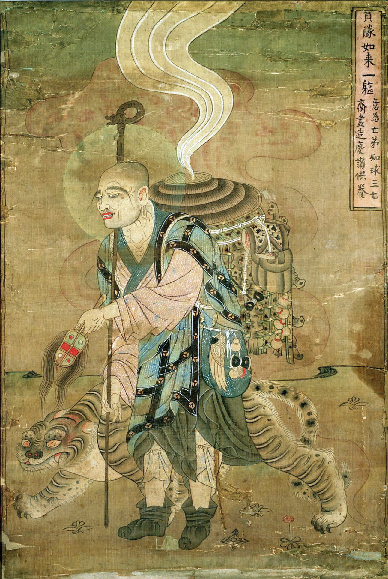 Painting of the Buddhist pilgrim Xuanzang walking with a staff while riding or accompanied by a tiger.